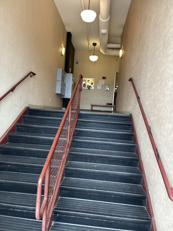 Conducted on-site assessment for complete HVAC system replacement in commercial building with interior stairwell access. Evaluated existing ductwork configuration in ceiling area and documented measurements of access points to determine equipment specifications and installation requirements for full system upgrade.