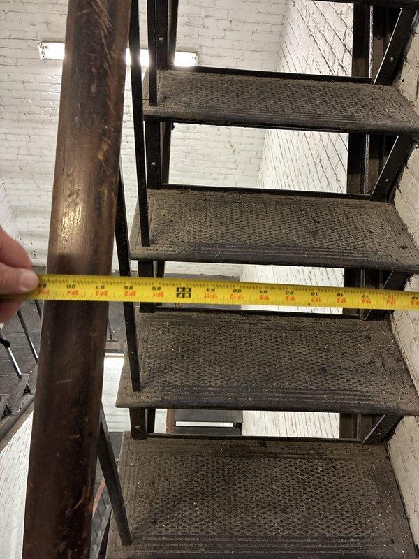 Conducted on-site assessment for complete HVAC system replacement in commercial building with interior stairwell access. Evaluated existing ductwork configuration in ceiling area and documented measurements of access points to determine equipment specifications and installation requirements for full system upgrade.