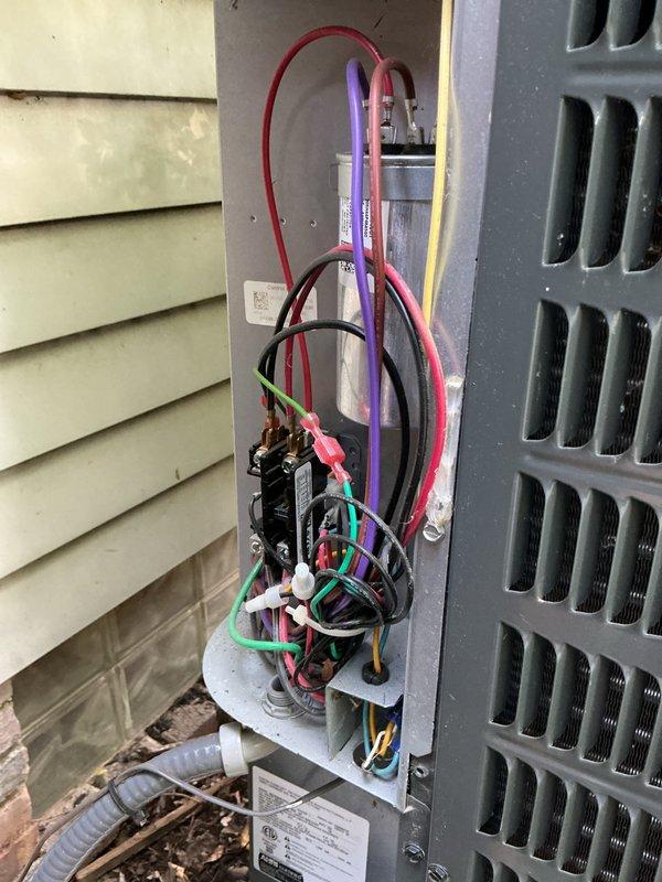 Completed comprehensive cooling season tune-up on residential air conditioning system. Performed visual inspection of outdoor condenser unit, verified electrical connections and contactor operation, checked capacitor functionality, and confirmed proper system operation. Unit found in satisfactory working condition with normal seasonal debris accumulation around base.
