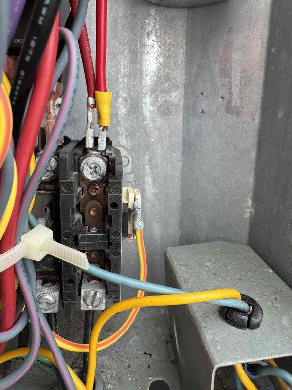 Completed comprehensive cooling system tune-up on residential HVAC unit. Inspected electrical connections at contactor assembly, verified proper wire terminations and component integrity, and evaluated overall system operation. All equipment found to be functioning within normal parameters with routine maintenance performed per seasonal checklist.