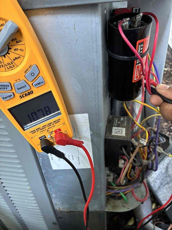 # HVAC Cooling Maintenance Summary

Completed routine preventive maintenance on residential cooling system as part of ongoing service plan. Performed comprehensive system diagnostics including electrical testing with multimeter to verify capacitor function and electrical component integrity. Measured temperature differential across system components, recording 5.0°F reading at ductwork location. All electrical connections, wiring, and capacitor tested within normal operating parameters. System operating efficiently with no deficiencies noted.

---

# Detailed Service Description

Performed scheduled preventive maintenance inspection on residential air conditioning system. Conducted thorough evaluation of all major system components to ensure optimal performance and reliability during cooling season.

**Electrical System Diagnostics:**
Utilized digital multimeter to test electrical components within the condensing unit's control panel. Performed voltage and capacitance measurements on t