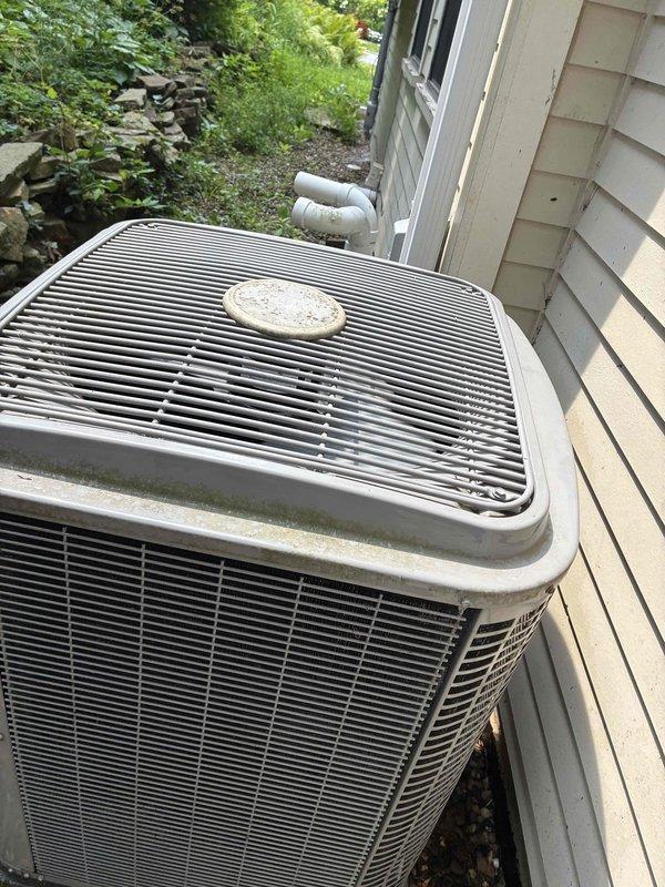 Replaced failed condenser fan motor on residential air conditioning unit and performed thorough coil cleaning to restore proper heat exchange efficiency. System tested and confirmed operational with proper airflow and cooling performance upon completion.