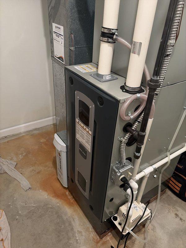 Completed cooling tune-up on dual-system HVAC installation including indoor air handler unit in utility area and outdoor condensing unit. Performed standard maintenance inspections, verified proper operation of both systems, and documented equipment conditions with photos.