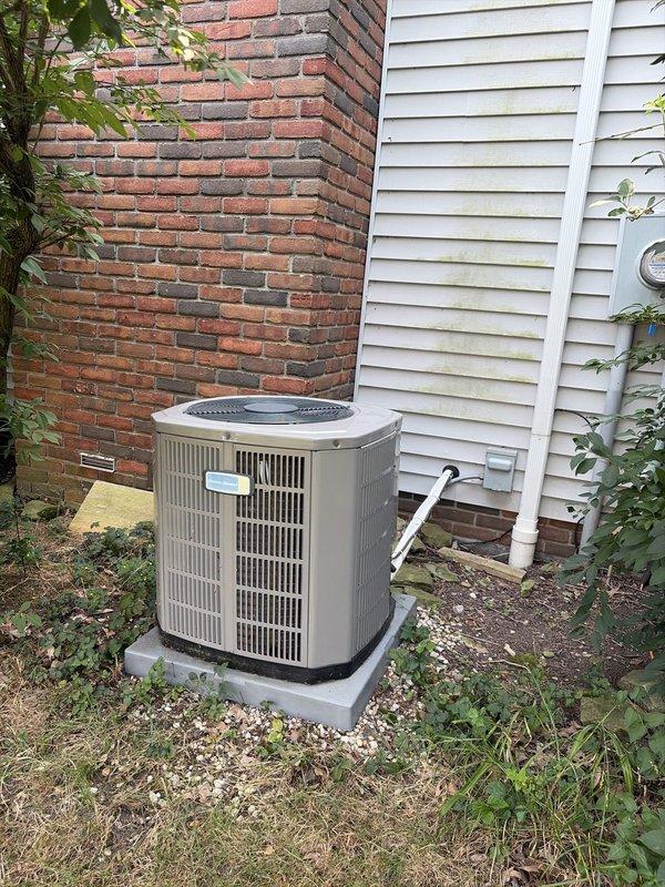 Completed cooling tune-up on dual-system HVAC installation including indoor air handler unit in utility area and outdoor condensing unit. Performed standard maintenance inspections, verified proper operation of both systems, and documented equipment conditions with photos.