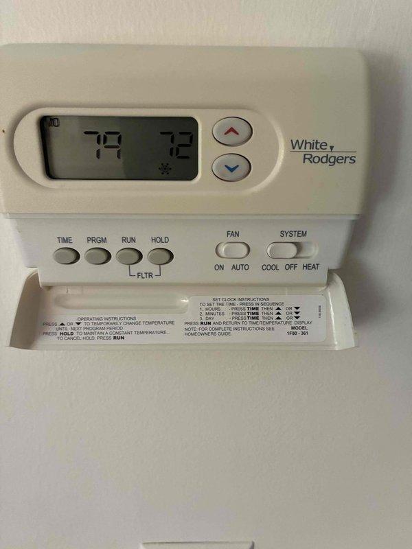 Responded to no cooling complaint at residential property. Upon arrival, found outdoor condenser unit accessible with previous obstructions cleared. Verified thermostat set to cooling mode at 72°F with display showing current temperature of 79°F. Performed diagnostic evaluation of system operation and documented equipment condition with photographs for service records.