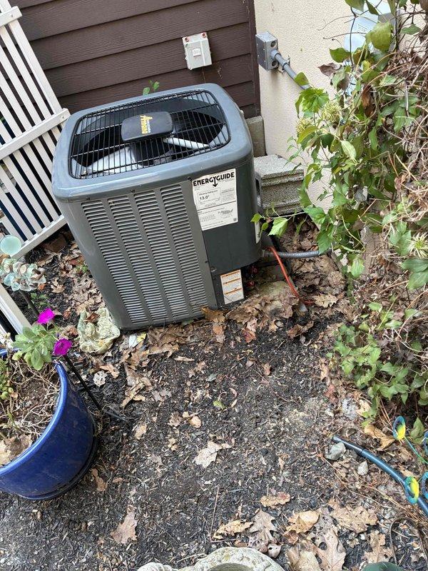 Responded to no cooling complaint at residential property. Upon arrival, found outdoor condenser unit accessible with previous obstructions cleared. Verified thermostat set to cooling mode at 72°F with display showing current temperature of 79°F. Performed diagnostic evaluation of system operation and documented equipment condition with photographs for service records.