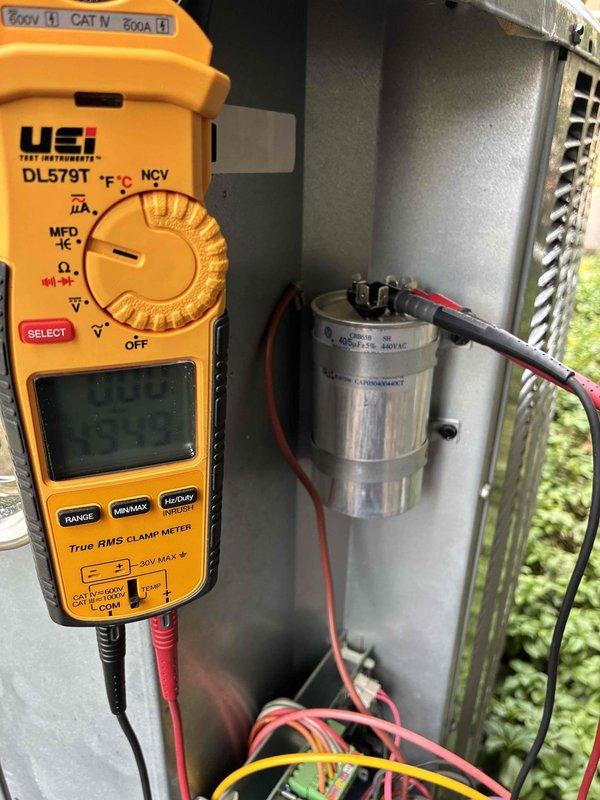 Performed comprehensive cooling system tune-up and diagnostics. Conducted electrical testing of the capacitor using a digital multimeter to verify proper voltage and capacitance values, ensuring optimal compressor and fan motor operation. All components tested within manufacturer specifications and system confirmed operational for the cooling season.