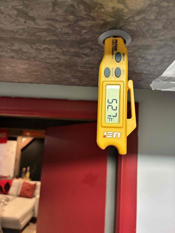 Completed routine HVAC cooling maintenance on system over 10 years old. Performed temperature diagnostics at supply register measuring 52.1°F and return air at 69.0°F, confirming adequate temperature differential and proper system cooling performance. Inspected outdoor condensing unit and documented equipment condition with updated service records.
