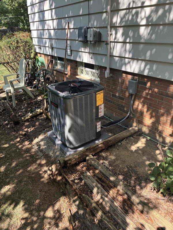 # HVAC Install - Complete System

Completed full residential HVAC system installation including 80% efficiency furnace, air conditioning condenser unit, humidifier, air scrubber, and chimney liner. Installed new furnace in basement mechanical room with proper venting through stainless steel exhaust piping connected to existing brick chimney structure. Mounted outdoor AC condenser unit on concrete pad against building exterior with appropriate clearances for airflow and service access. Ran refrigerant lines and electrical conduit from outdoor unit through foundation, connecting to indoor air handler. Installed whole-home humidification system and air scrubber for enhanced indoor air quality. Completed all ductwork connections to new equipment using metallic duct transitions at furnace plenum. Verified all electrical connections meet code requirements, with proper disconnect and meter coordination. Tested system startup, confirmed proper operation of heating and cooling cycles, verified 