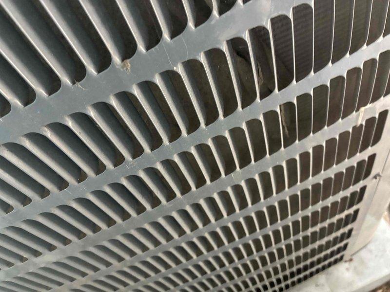 Responded to service call for non-operational air conditioning system affecting whole-house cooling. Upon arrival, performed diagnostic inspection of 4-year-old outdoor condensing unit. Visual examination revealed heavily soiled condenser coil with significant accumulation of dirt, dust, and debris lodged between fins, restricting proper airflow and heat transfer capability. Thoroughly cleaned condenser coil using appropriate methods to remove buildup and restore optimal fin spacing and airflow. Verified system operation and proper cooling function upon completion. Unit restored to normal operating condition.