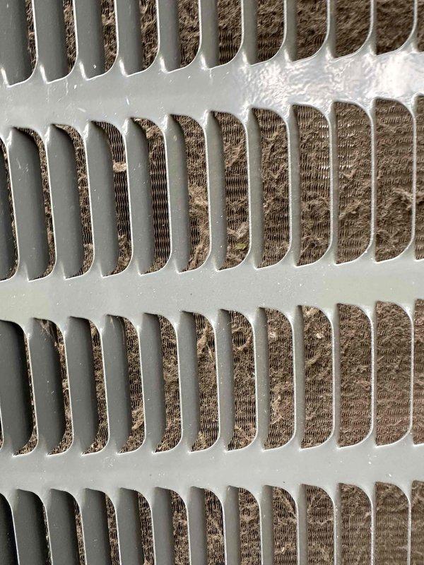 Completed preventative maintenance on residential cooling system. Inspection revealed frost accumulation on evaporator coil fins and upper frame assembly, indicating possible airflow restriction or refrigerant charge issues. Examined electrical components including capacitor and wiring connections, verified proper connections of all conductors, and ensured system components were functioning within normal parameters.