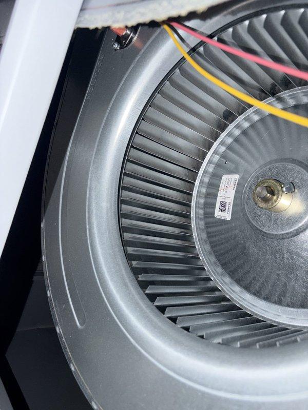 Performed comprehensive AC tune-up on residential air conditioning system with no reported issues. Conducted thorough inspection of blower motor assembly, verified proper operation of squirrel cage fan wheel and electrical connections, and assessed airflow measurements across ductwork system registering 58 CFM. All components found operating within normal parameters with minimal dust accumulation noted on blower assembly.