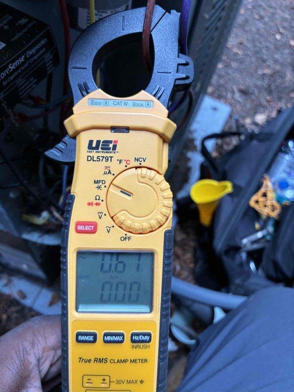 Performed comprehensive cooling system maintenance on residential outdoor HVAC unit. Conducted electrical diagnostics using clamp meter to verify proper amperage draw and system performance, inspected refrigerant lines and condenser components for proper operation, and confirmed unit is functioning within manufacturer specifications.