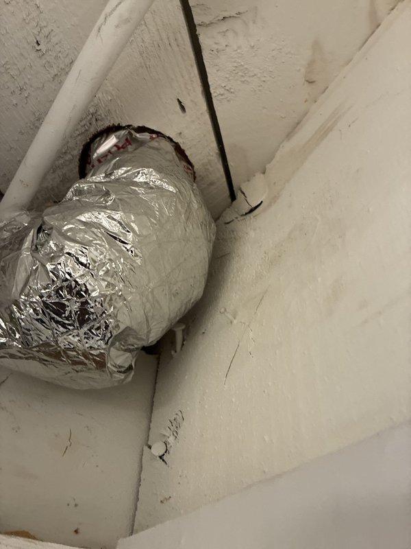 Completed warranty inspection on new HVAC installation. Verified proper installation of flexible ductwork at ceiling junction and confirmed escutcheon plate placement at floor register. All components meeting manufacturer specifications with no deficiencies noted.