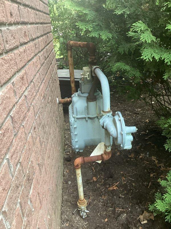 Performed scheduled maintenance on Generac standby generator system. Inspected control and information center panel, verified all indicator lights and control functions operating properly, and confirmed AUTO/OFF/MAN selector switch functionality. Checked system fuse, oil level, coolant temperature, and battery voltage. Examined external components including fuel lines, connections, and mounting hardware for signs of wear or deterioration. All systems tested and found to be in proper working order with no fault conditions present.