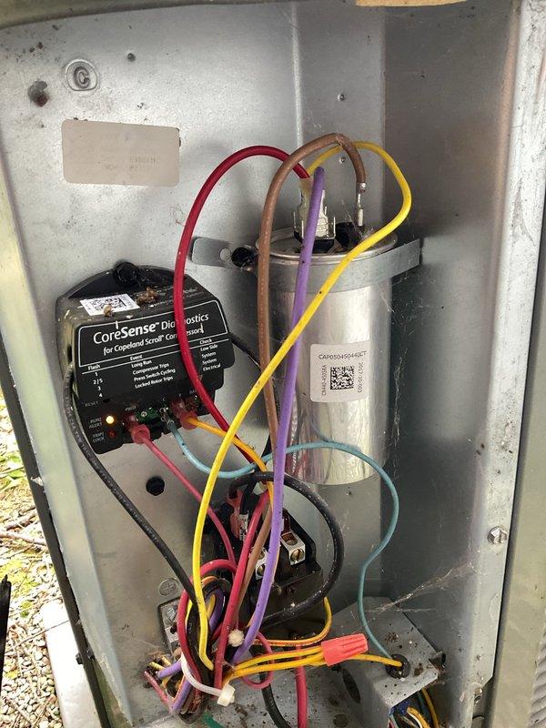 Completed scheduled preventive maintenance on residential air conditioning system. Performed comprehensive cooling system inspection including temperature differential testing, which confirmed proper refrigerant charge with suction line temperature reading of -5.3°F. Inspected and tested electrical components including capacitor and CoreSense monitoring system, verifying all connections secure and LED indicators functioning normally. All system components operating within manufacturer specifications.