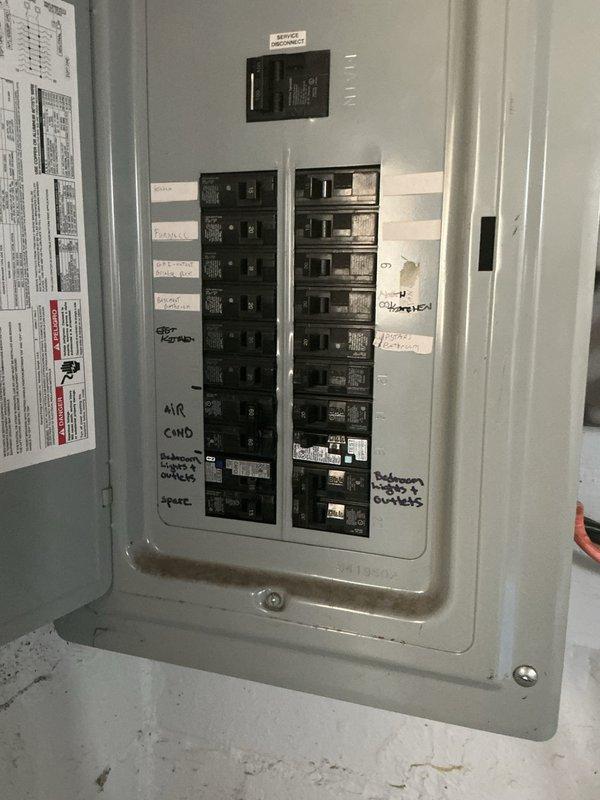 Installed new Siemens sub panel and circuit breaker system with 15 amp maximum capacity rated at 11.1 minimum amps. Completed full electrical panel installation including proper circuit breaker arrangement, wire routing, and ground bar connections with appropriate color-coded wiring throughout the enclosure. All circuits were properly labeled for identification, including A/C condenser and other designated loads, and the panel was mounted on plywood backing with all connections secured to code specifications.