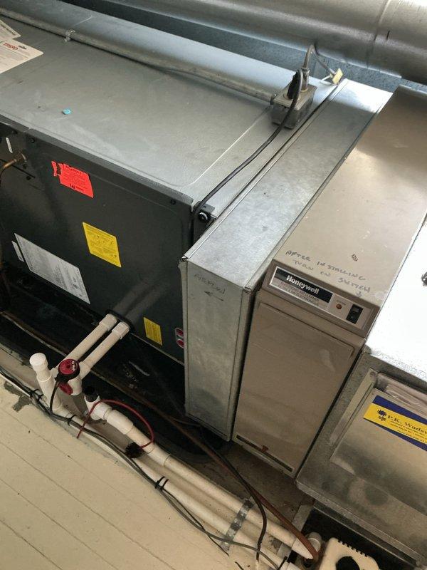 Completed scheduled preventive maintenance on commercial HVAC cooling system serving office staging area. Inspected and serviced multiple air handling units, verified proper operation of Honeywell control panel, checked refrigerant lines and PVC condensate drainage system with associated fittings and valves, and confirmed all ductwork connections were secure and functioning properly.