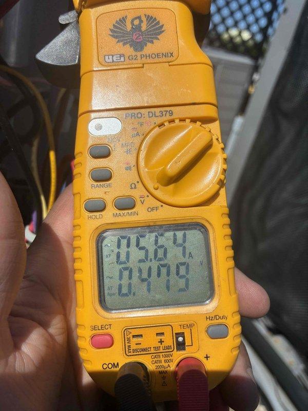 Completed comprehensive cooling system tune-up on residential HVAC unit. Performed diagnostic testing using digital multimeter to verify electrical readings and system performance, inspected compressor operation with CoreSense diagnostic tool, and checked refrigerant pressures with manifold gauges. All components operating within normal parameters, capacitor date verified, and system confirmed ready for continued service.
