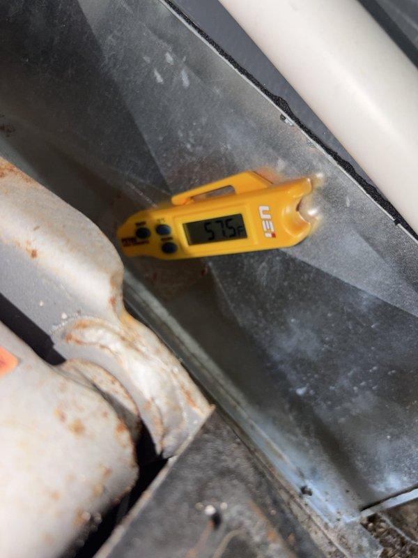Completed comprehensive cooling system tune-up and inspection. During service, identified significant frost accumulation on air handler unit indicating possible airflow restriction or refrigerant issue. Measured condensate drainage system and verified proper operation of all mechanical components.