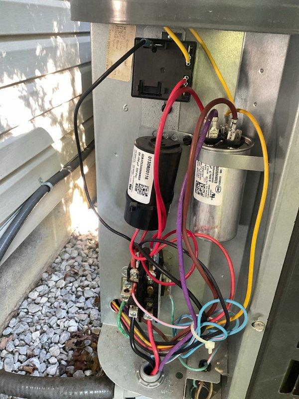 Completed comprehensive cooling system maintenance on HVAC unit. Performed thorough inspection of electrical components including dual capacitors, contactor relay, and associated wiring connections. Verified all wire terminations were secure across compressor and fan motor circuits. Measured and documented system performance parameters, recording temperature differential of 37.06 degrees. Inspected refrigerant lines for proper insulation and condensation levels. All components found operating within normal specifications with no deficiencies noted.