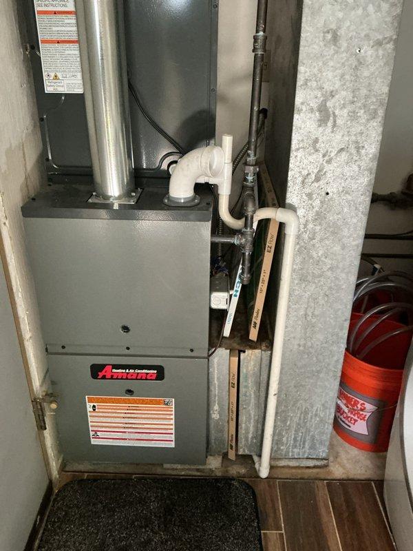 Performed seasonal startup and maintenance inspection on Amana furnace system. Verified all components operational, checked electrical connections, inspected PVC venting and condensate drain lines, confirmed proper airflow, and tested safety controls. System found to be functioning within manufacturer specifications with no issues identified.