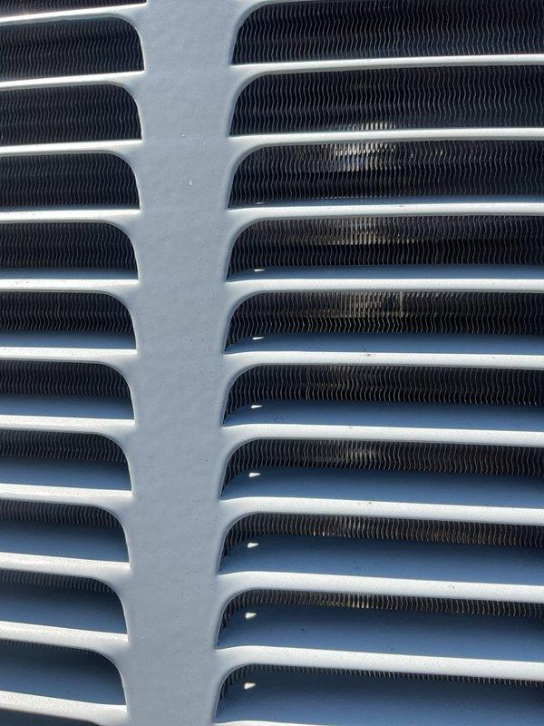 Completed comprehensive cooling tune-up on Ameristar residential air conditioning system. Performed visual inspection of condenser unit, verified proper operation of all components, and inspected heat exchanger coils which were found to be in clean, well-maintained condition with no blockages or deterioration noted.