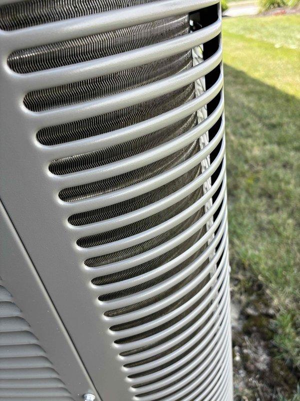 Performed routine preventive maintenance on residential cooling system. Inspected outdoor condenser unit, confirming coils are clean with no debris accumulation and fins are straight and undamaged. Verified capacitor connections are secure with proper wire terminations, and all electrical components within unit are functioning properly with no signs of wear or deterioration.