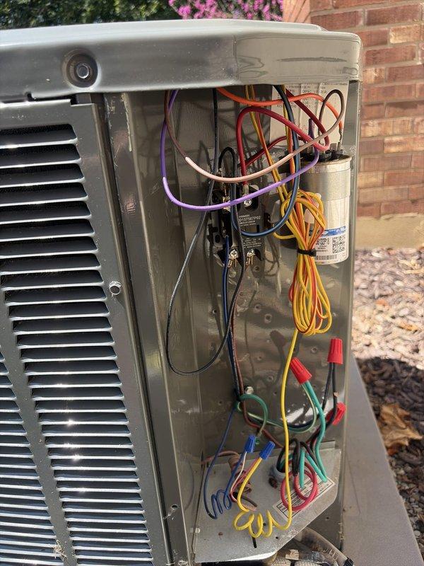 Completed first-year preventive maintenance visit on residential air conditioning system. Performed comprehensive inspection of outdoor condensing unit, including electrical component evaluation with capacitor testing using digital multimeter to verify proper operation and electrical readings within manufacturer specifications. All wiring connections, internal components, and system functionality confirmed to be operating normally with no deficiencies noted.