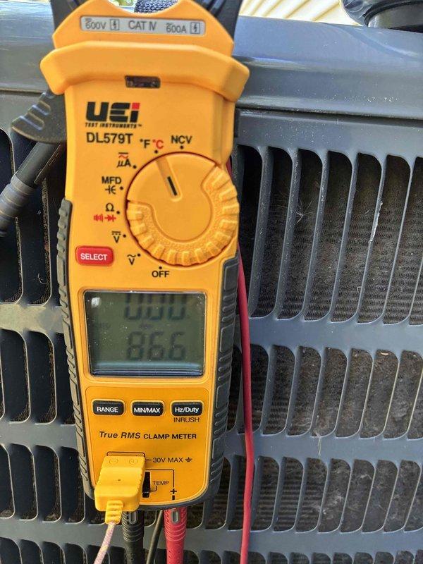 Completed scheduled HVAC cooling system maintenance on residential unit. Performed comprehensive system inspection including air filter replacement with new pleated media filter, verified proper airflow, and conducted electrical diagnostics on outdoor condenser unit using clamp meter to measure amperage draw and temperature readings. All components operating within normal parameters with system showing 86.6°F temperature reading and zero amp draw at time of testing, indicating unit was in standby mode during diagnostic procedures.