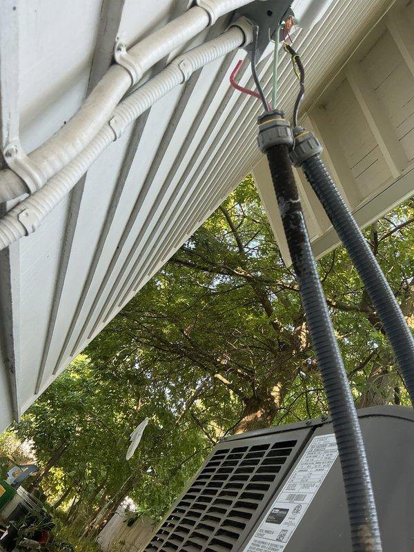 Disconnected residential air conditioning unit to allow for building waterproofing work on exterior brick wall. Upon completion of waterproofing, returned to site and reinstalled the AC system, reconnecting refrigerant lines, electrical connections, and verifying proper operation of the outdoor condensing unit.