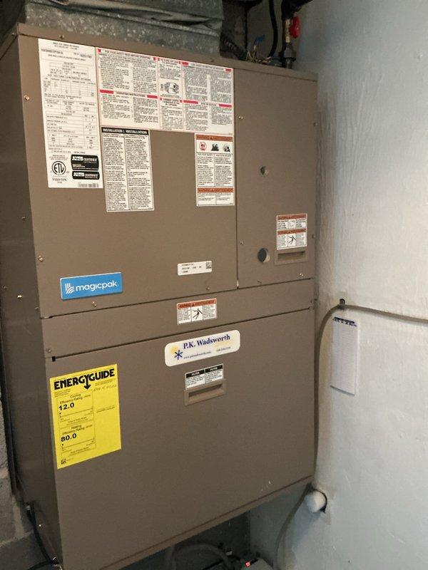 Completed routine cooling maintenance on residential HVAC system as part of ongoing preventative maintenance program. Performed standard inspection of furnace unit and associated components, verified proper operation of all safety labels and energy efficiency ratings, and documented equipment condition through photographic records. All systems functioning within normal parameters with no immediate service needs identified.
