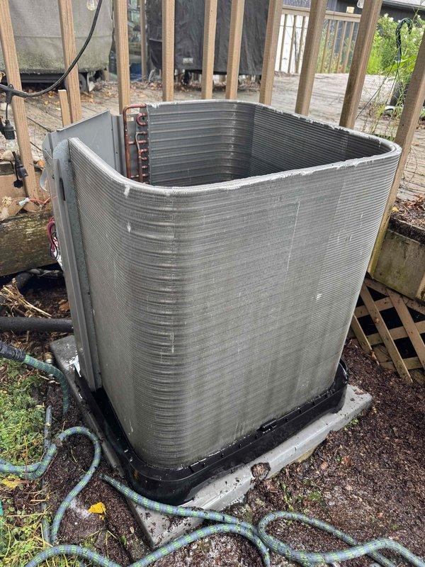 Responded to no cooling complaint with indoor temperature reading 84°F while thermostat set to 72°F. Upon inspection, found outdoor condenser unit with heavily soiled condenser coil covered in thick accumulation of dirt, dust, pollen, and environmental debris, significantly restricting airflow and reducing heat transfer efficiency. Performed thorough coil cleaning to remove buildup from fins and restored proper airflow through condenser. System tested and confirmed return to normal cooling operation.