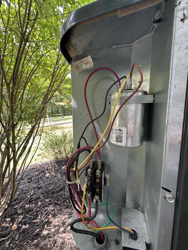 Completed cooling season tune-up on outdoor HVAC unit, including comprehensive electrical system inspection and performance testing. Verified capacitor condition, checked all electrical connections and wiring terminals, and measured system amperage draw at 0.3A to confirm proper compressor operation. All components found operating within normal parameters.