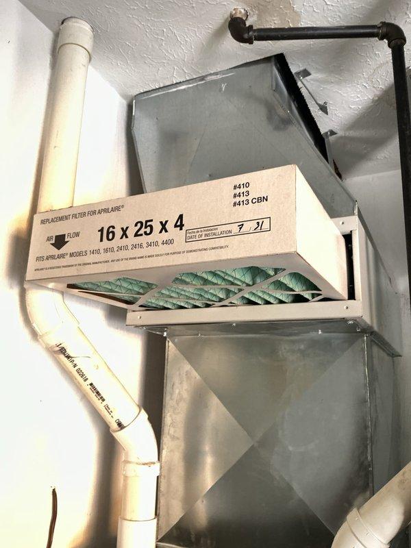 Responded to customer complaint of air conditioning unit unable to cool below 75 degrees. Inspected system including condenser unit and air handler assembly. Evaluated 16x25x4 air filter condition and verified proper installation in horizontal filter rack. Assessed condensate drain lines, refrigerant lines, and overall system operation to diagnose cooling performance issue.