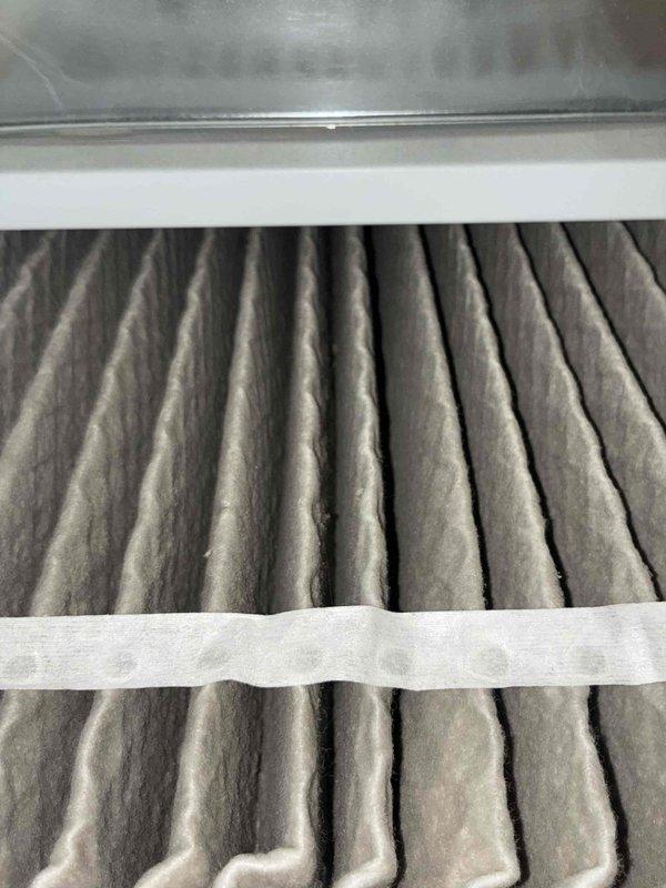 Completed comprehensive cooling system tune-up including inspection of air filter which showed moderate dust accumulation from normal operation. Performed electrical diagnostics and measurements on outdoor unit components to verify proper system operation and performance parameters within manufacturer specifications.
