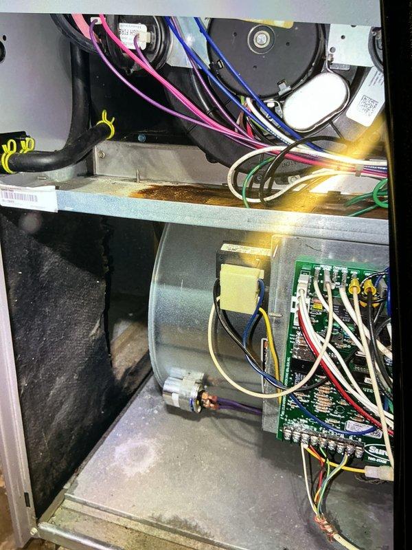 Completed scheduled cooling system maintenance on residential HVAC unit. Performed comprehensive inspection of air handler components including blower motor assembly, control board connections, and electrical wiring throughout the system. Verified proper operation of all mechanical and electrical components, checked condensate drainage system with associated PVC piping, and confirmed unit is operating efficiently with no issues identified during the maintenance visit.
