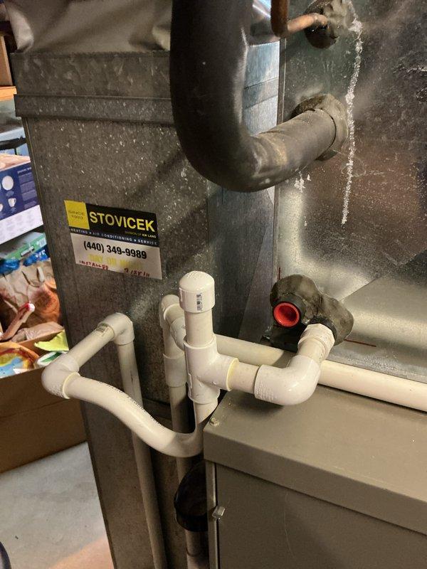 Completed scheduled cooling system maintenance on residential HVAC unit. Performed comprehensive inspection of air handler components including blower motor assembly, control board connections, and electrical wiring throughout the system. Verified proper operation of all mechanical and electrical components, checked condensate drainage system with associated PVC piping, and confirmed unit is operating efficiently with no issues identified during the maintenance visit.