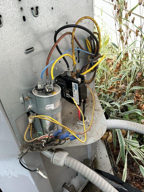 Completed comprehensive cooling system maintenance on residential air conditioning unit. Performed visual inspection of outdoor condensing unit electrical components including capacitor and contactor, verified proper wire connections and routing of refrigerant lines. Inspected indoor evaporator section including condensate drain line routing and refrigerant line insulation integrity. System operating within normal parameters following standard maintenance protocol.