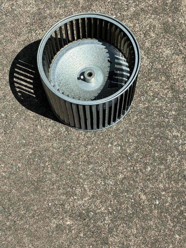 Performed comprehensive blower wheel and evaporator coil cleaning service on HVAC air handler unit. Removed blower assembly from housing, extracted squirrel cage blower wheel showing moderate dust and debris accumulation on blades and hub. Thoroughly cleaned blower wheel components to restore optimal airflow efficiency. Cleaned evaporator coil using appropriate cleaning solution to remove dirt buildup and ensure proper heat exchange. Reassembled blower motor assembly with vibration dampening mounts and returned unit to full operational status.