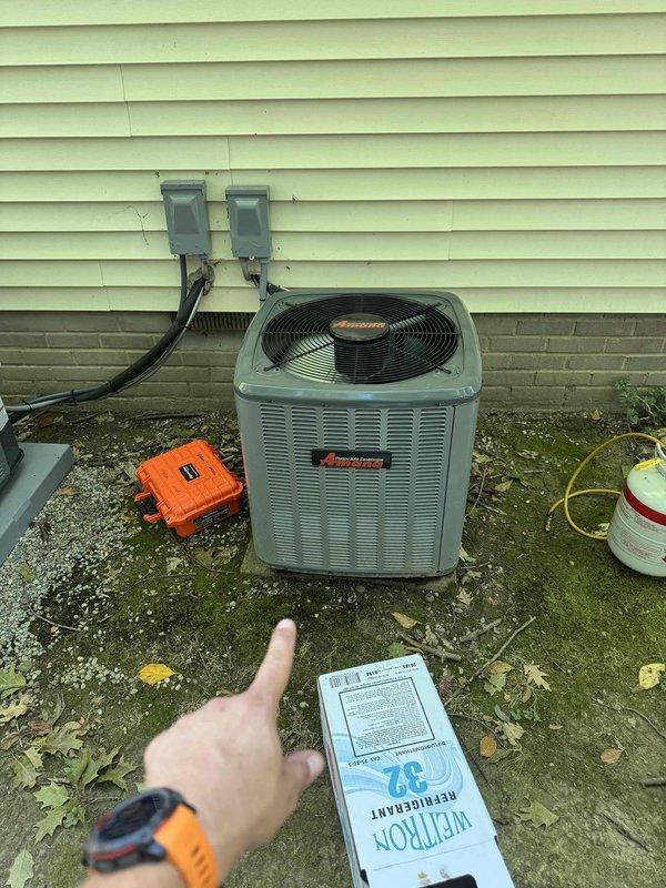 Responded to no cooling complaint for upstairs zone with thermostat reading 83°F despite setpoint of 75°F. Upon arrival, inspected outdoor condensing unit and found system low on refrigerant. Added R-32 refrigerant to manufacturer specifications, verified proper system operation, and confirmed adequate cooling restored to affected area.