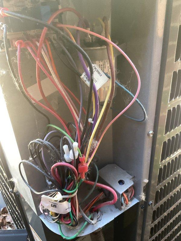 Responded to emergency maintenance request for commercial cooling system. Performed comprehensive MVP maintenance visit on air conditioning unit with focus on indoor air quality concerns. Inspected and documented electrical wiring connections at terminal block, verifying all wire terminations were secure and properly labeled. Examined pleated air filter in return air system, which showed signs of dander accumulation. Completed full system inspection of internal components including capacitor and electrical controls. All wiring configurations were found to be properly installed with appropriate color-coding and identification tags in place. Filter replacement recommended to address air quality concerns and maintain optimal airflow.