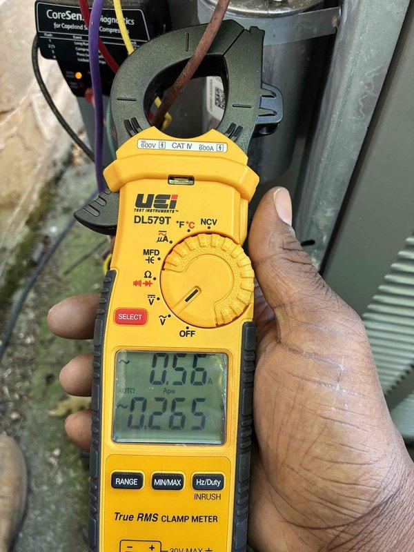 # HVAC Cooling Maintenance - Two Systems

Completed comprehensive preventive maintenance service on two cooling systems as part of recurring maintenance agreement. Performed thorough inspection of electrical components including fuse assemblies, verifying proper condition and secure mounting of TR25R fuses in disconnect panel. Conducted amperage draw measurements using clamp meter on system components, recording operational readings to verify equipment performance within manufacturer specifications. All electrical connections, wiring, and control components inspected and found in satisfactory operating condition. Both cooling systems tested and confirmed operational.