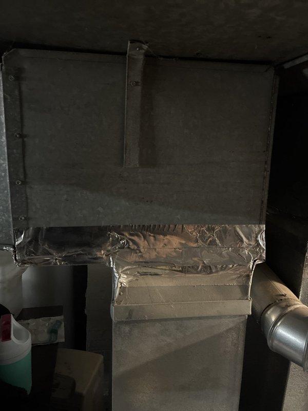 Conducted comprehensive HVAC system evaluation for full system replacement estimate. Assessed existing ductwork installation in basement mechanical space, including main supply plenum and distribution components. Inspected duct sealing at connection points with aluminum foil tape and evaluated overall duct integrity. Reviewed current equipment configuration and spatial constraints for potential new system installation. Provided multiple equipment options for air conditioning replacement as well as complete HVAC system upgrade alternatives to meet customer needs.