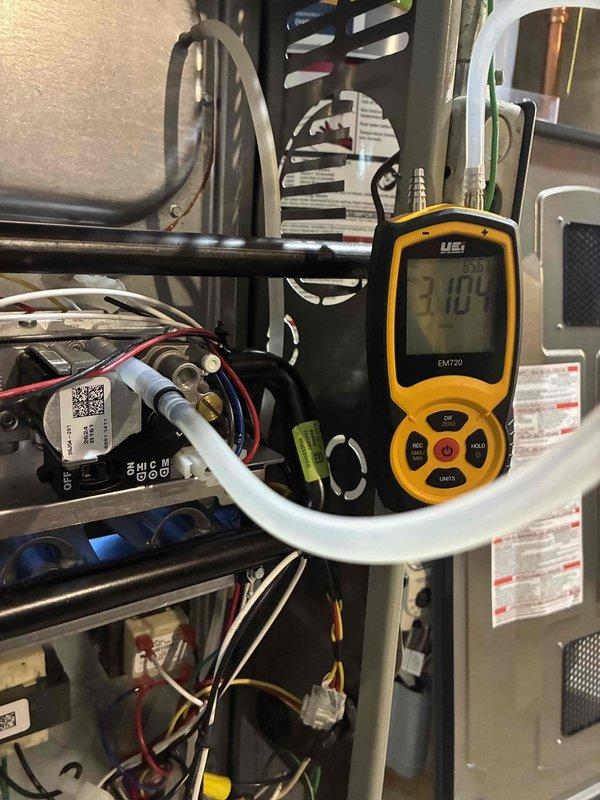 Completed full HVAC system installation including 80% efficiency furnace, air conditioning unit, and ductwork with liner in residential basement location. Installed new furnace unit with proper electrical circuit connection, verified all wiring connections and control board functionality using digital multimeter for voltage and amperage readings. Connected metallic ductwork with secure fastening and proper sealing, ensuring optimal airflow throughout the system. Integrated wall-mounted humidifier unit to furnace system for whole-home humidity control. Verified all manufacturer specifications, safety controls, and operational parameters met code requirements. System tested and confirmed operational with all components functioning as designed.