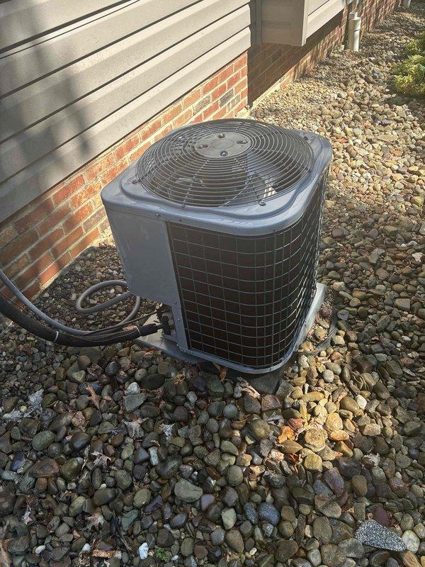 Completed routine preventative maintenance on residential split-system air conditioning unit. Performed comprehensive inspection of outdoor condensing unit, verified proper operation of condenser fan and compressor, checked refrigerant lines for secure connections, and confirmed electrical disconnect box functionality. Unit operating within normal parameters with no deficiencies noted.