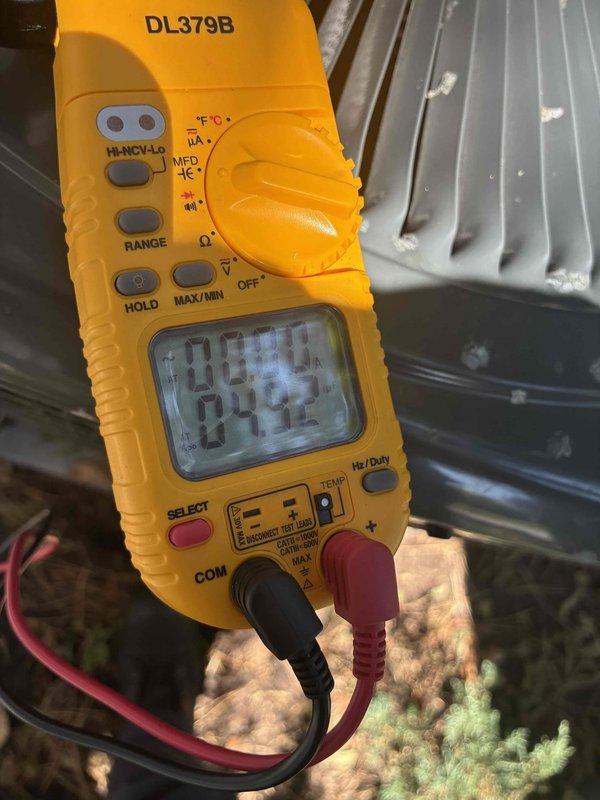 Completed scheduled preventive maintenance on residential air conditioning system. Performed comprehensive inspection of electrical components including capacitor, contactor, and associated wiring connections. Verified proper electrical readings using digital clamp meter, confirming system operating within normal parameters at 0.00 amp draw during testing phase. All electrical connections secure, capacitor functioning properly, and unit ready for continued cooling operation.