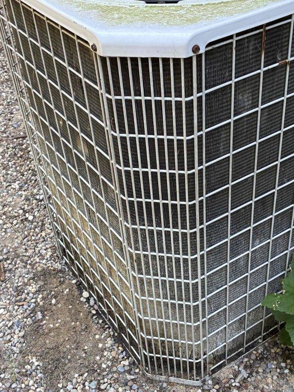 Responded to no cooling complaint on residential air conditioning unit. Upon arrival, measured supply air temperature at 70.7°F, confirming inadequate cooling performance. Inspected outdoor condensing unit, which showed signs of weathering with visible staining and minor corrosion on top panel, though protective grilles remained intact with no major debris accumulation.