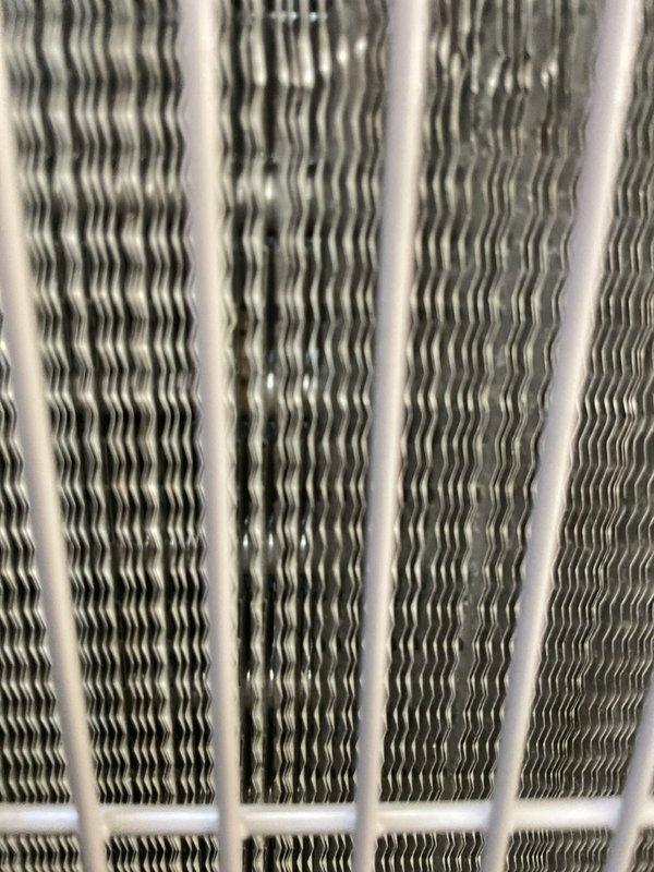 Completed scheduled cooling system maintenance visit. Performed comprehensive inspection of air conditioning unit, including temperature differential measurements at supply registers and thorough examination of evaporator coil assembly. Coil fins found in good condition with minimal debris accumulation. All system components operating within normal parameters.