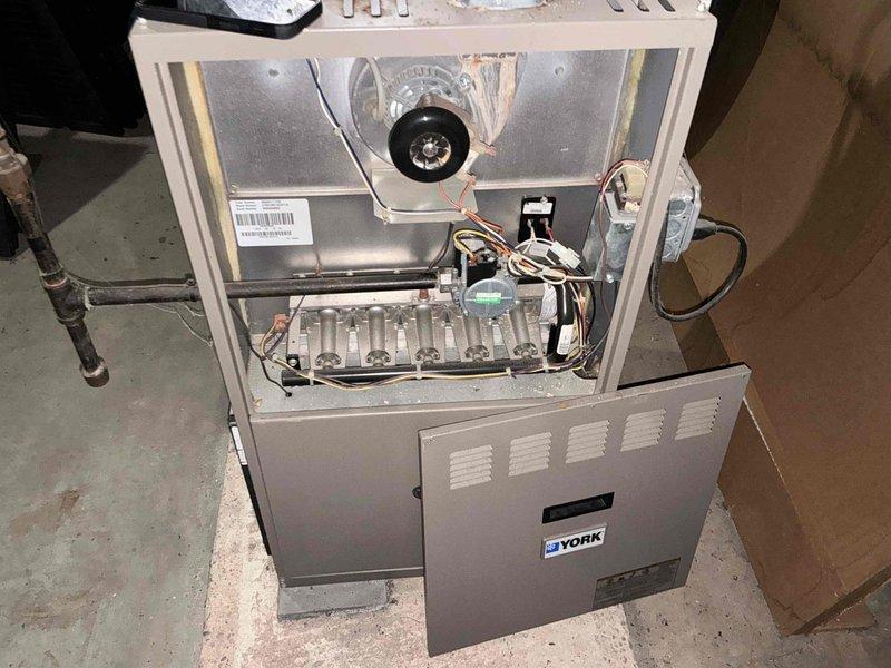 Conducted comprehensive system evaluation and presented full replacement options for dual-zone HVAC system. Inspected existing York furnace unit, documented internal components including blower motor assembly, heat exchanger, burner assembly, gas valve, igniter, control boards, and electrical connections. Property equipped with two complete heating and cooling systems requiring equipment replacement proposals.